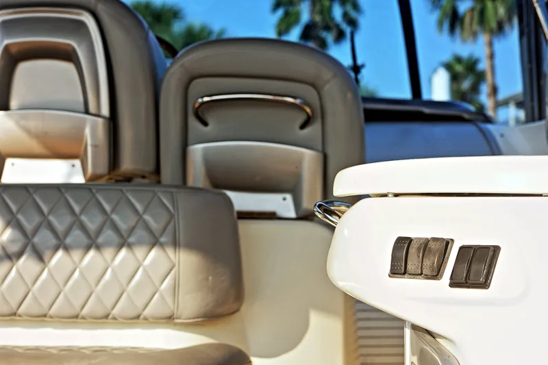 Slide: The Image of Interior of 2008 Cranchi Mediterranee 43 yacht with leather seating and control panel. - 13