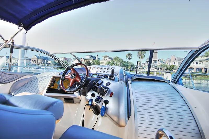 Slide: The Image of Cockpit of 2008 Cranchi Mediterranee 43 yacht with modern controls and waterfront view. - 14