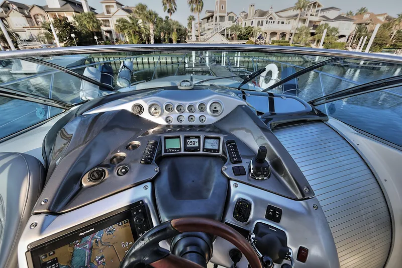 Slide: The Image of Cockpit view of 2008 Cranchi Mediterranee 43 yacht with modern navigation instruments. - 15