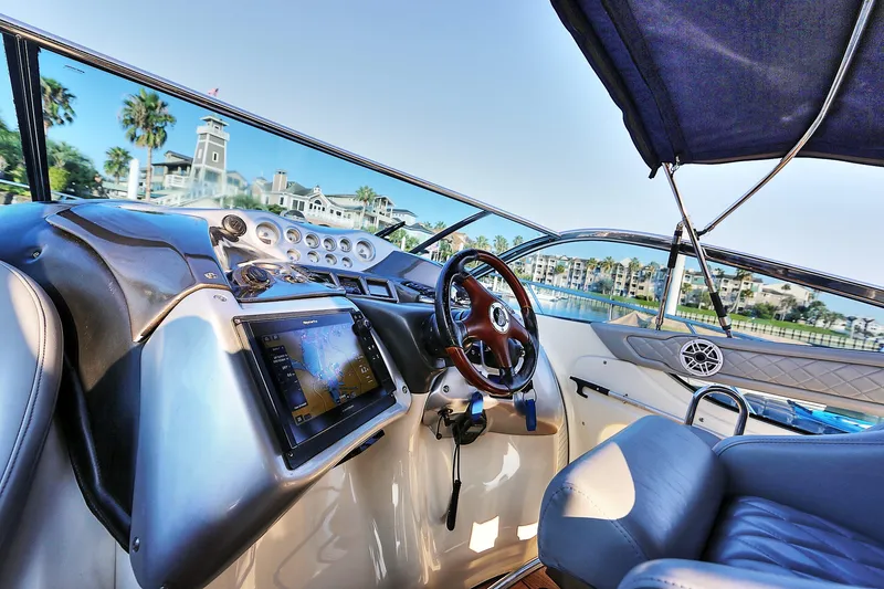 Slide: The Image of 2008 Cranchi Mediterranee 43 yacht cockpit with steering wheel and navigation system. - 18
