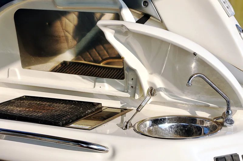 Slide: The Image of Outdoor kitchen on 2008 Cranchi Mediterranee 43 yacht with sink and grill. - 22