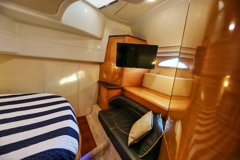 Slide: The Image of Luxurious interior of 2008 Cranchi Mediterranee 43 yacht with cozy seating and TV. - 24