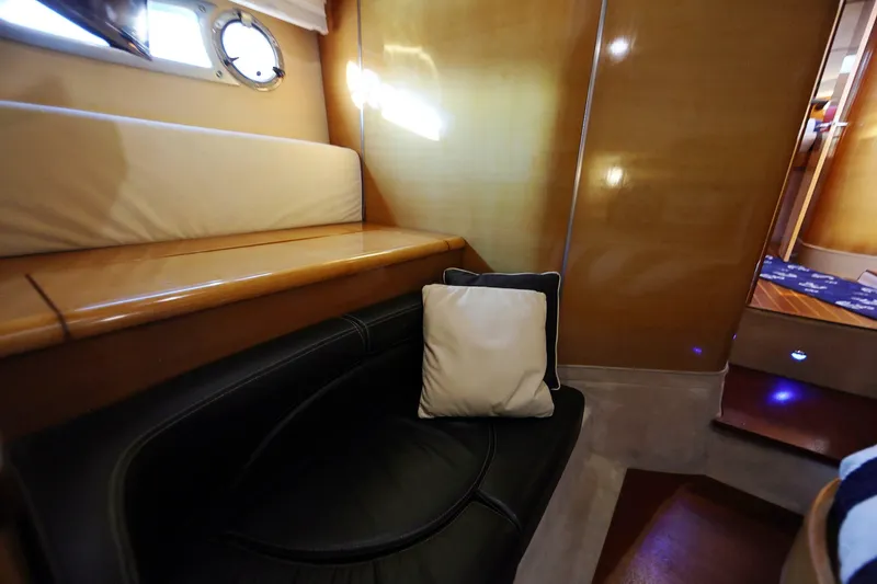 Slide: The Image of Interior of 2008 Cranchi Mediterranee 43 yacht with leather seating and wooden finishes. - 25