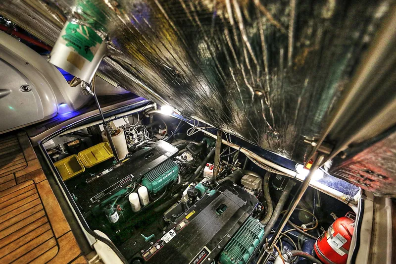 Slide: The Image of Engine room of 2008 Cranchi Mediterranee 43 yacht, showcasing dual engines and equipment. - 34