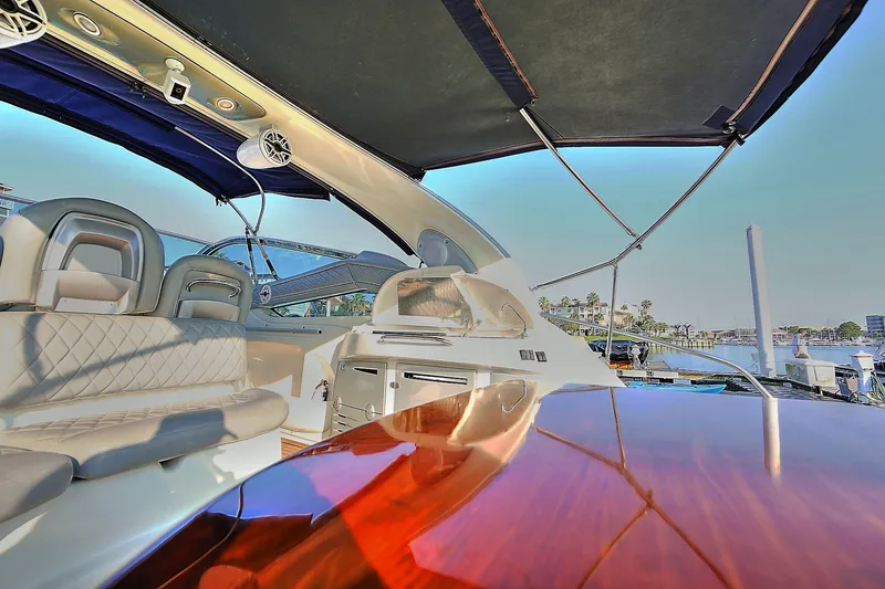 Slide: The Image of Luxurious interior of 2008 Cranchi Mediterranee 43 yacht with elegant seating and polished wood table. - 39
