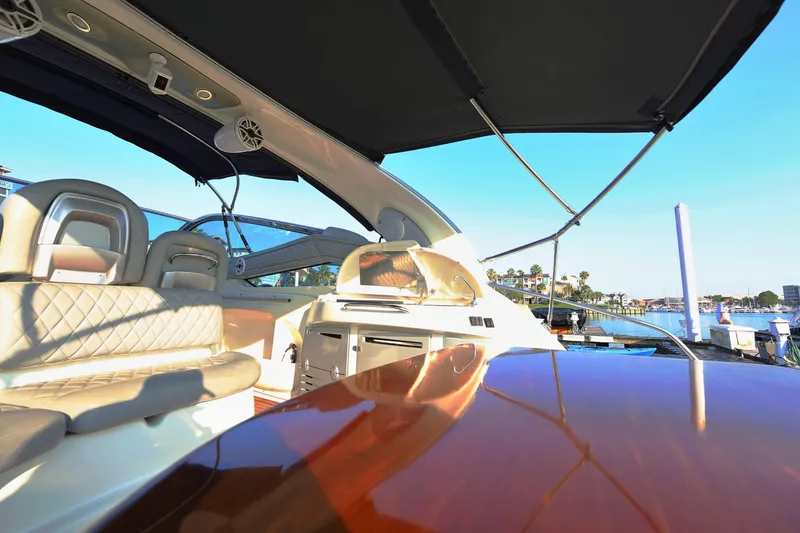 Slide: The Image of Luxurious 2008 Cranchi Mediterranee 43 yacht interior with elegant seating and waterfront view. - 44