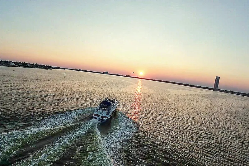 Slide: The Image of 2008 Cranchi Mediterranee 43 yacht cruising at sunset on open water. - 6