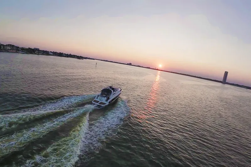 Slide: The Image of 2008 Cranchi Mediterranee 43 yacht cruising at sunset on tranquil waters. - 8