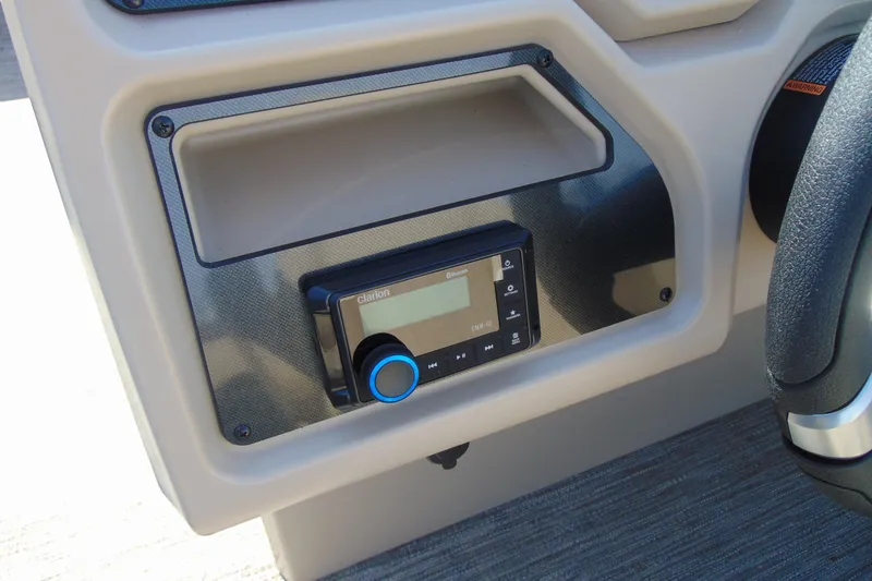 Slide: The Image of Dashboard of 2026 Godfrey EX 1680 CX with Clarion audio system. - 15