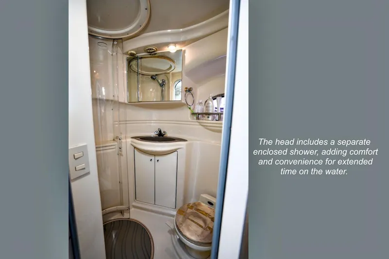 Slide: The Image of 2000 Maxum 3700 SCR yacht bathroom with enclosed shower and vanity. - 17