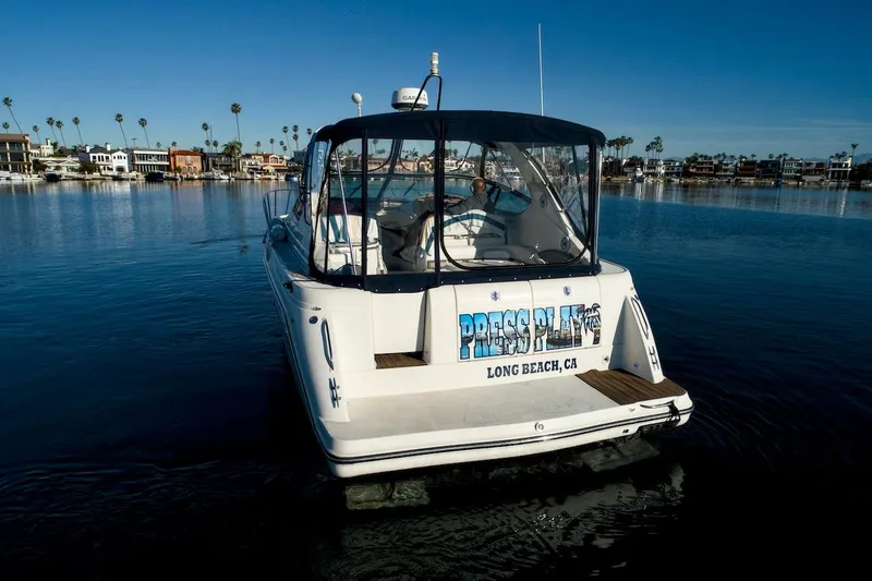 Slide: The Image of 2000 Maxum 3700 SCR boat on calm water in Long Beach, CA. - 2