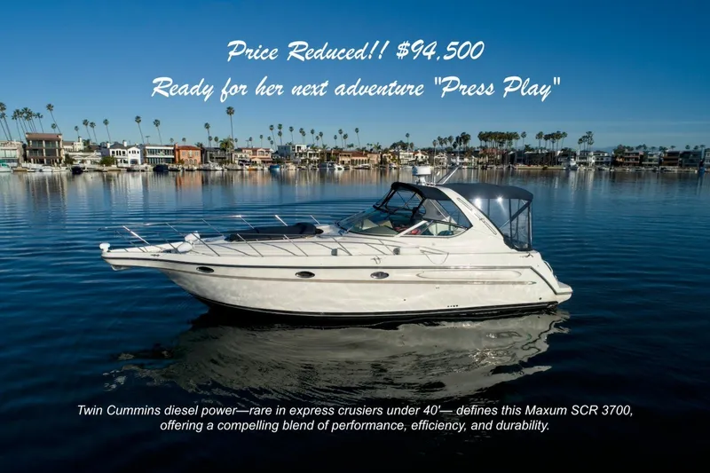 The Image of 2000 Maxum 3700 SCR boat on calm water, price reduced to $94,500. - 0