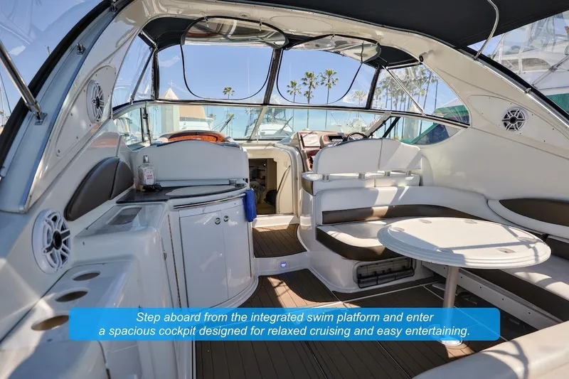 Slide: The Image of Interior view of 2000 Maxum 3700 SCR yacht with spacious cockpit and seating area. - 4