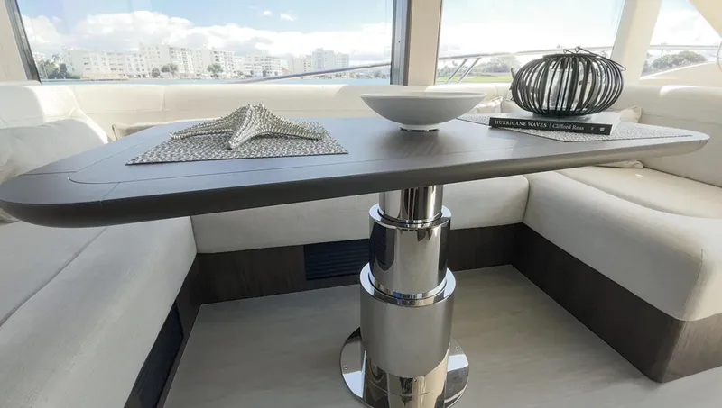 Slide: The Image of Modern interior of 2024 Galeon 560 Fly yacht with elegant table and decor. - 15