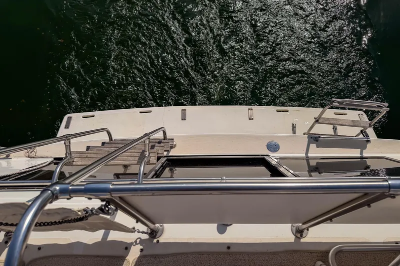 Slide: The Image of View from the deck of a 1985 Blue Water 51 Coastal yacht, overlooking the water. - 9