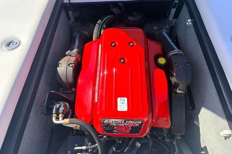 Slide: The Image of Engine of 2005 Nautique Super Air Nautique 210 with red cover. - 7