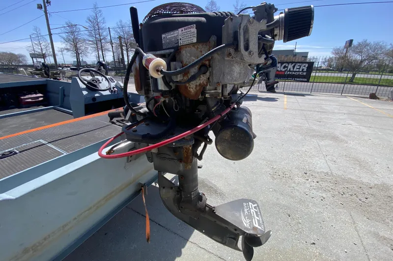 Slide: The Image of 2009 Pro-Drive X Series 17' boat motor in outdoor setting. - 19