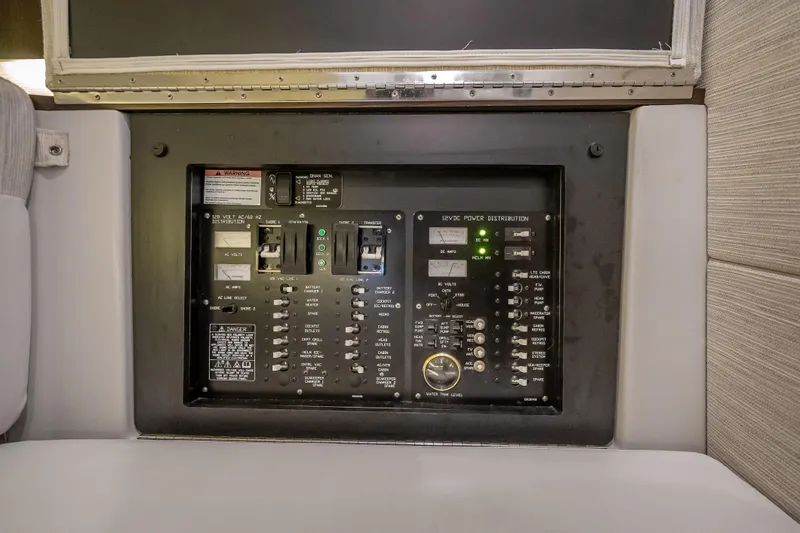 Slide: The Image of Electrical control panel on 2022 Cruisers Yachts 38 GLS OB boat interior. - 37