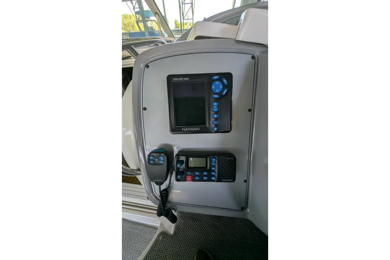 Slide: The Image of Control panel of 2004 Maxum 3700 SY boat with Navman Tracker 5500. - 17