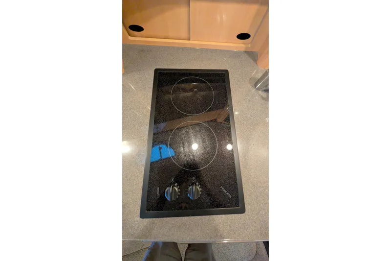 Slide: The Image of Glass cooktop in a 2004 Maxum 3700 SY yacht kitchen. - 26