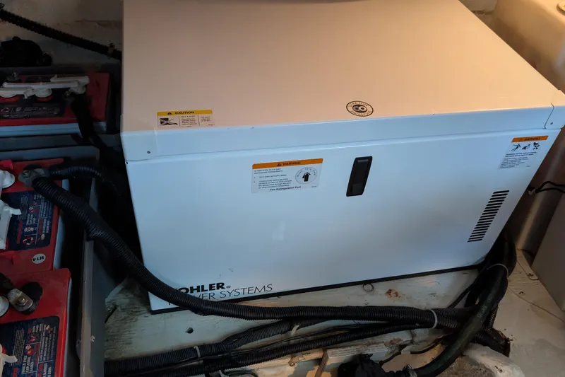 Slide: The Image of Kohler power system in 2004 Maxum 3700 SY boat engine room. - 42