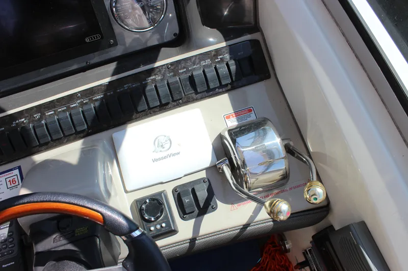 Slide: The Image of Control panel of a 2006 Sea Ray 40 Sundancer boat with VesselView display. - 13