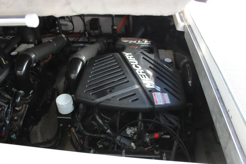 Slide: The Image of Engine compartment of a 2006 Sea Ray 40 Sundancer with Mercury engine. - 15
