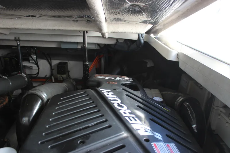 Slide: The Image of Engine compartment of a 2006 Sea Ray 40 Sundancer with Mercury engine. - 17