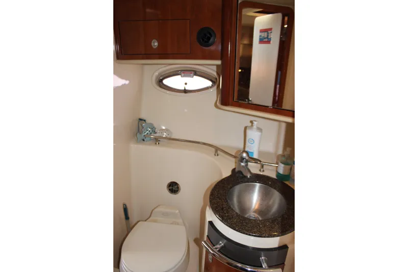 Slide: The Image of Bathroom interior of 2006 Sea Ray 40 Sundancer yacht with sink and toilet. - 30