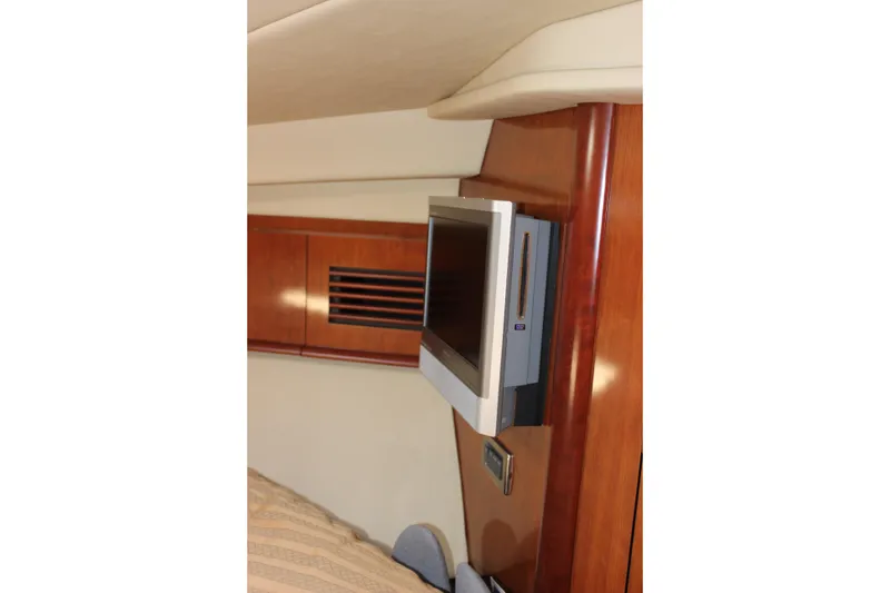 Slide: The Image of Flat-screen TV mounted in 2006 Sea Ray 40 Sundancer yacht interior. - 37