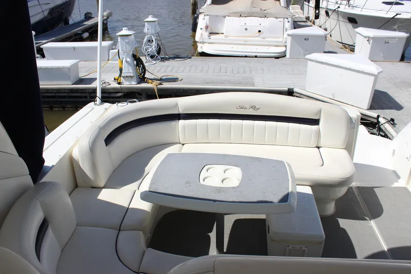 Slide: The Image of Luxurious seating area on a 2006 Sea Ray 40 Sundancer yacht at the dock. - 7