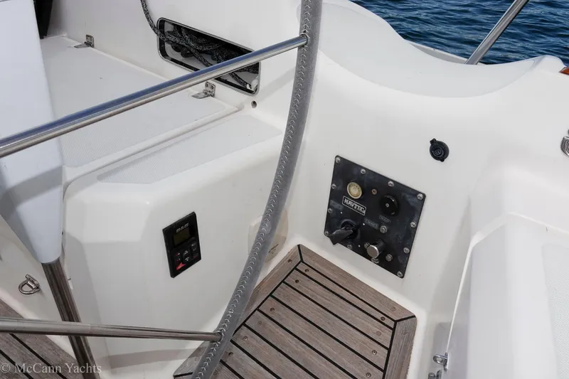 Slide: The Image of Alden 43 Aft Cockpit yacht, 1993 model, featuring control panel and teak flooring. - 16