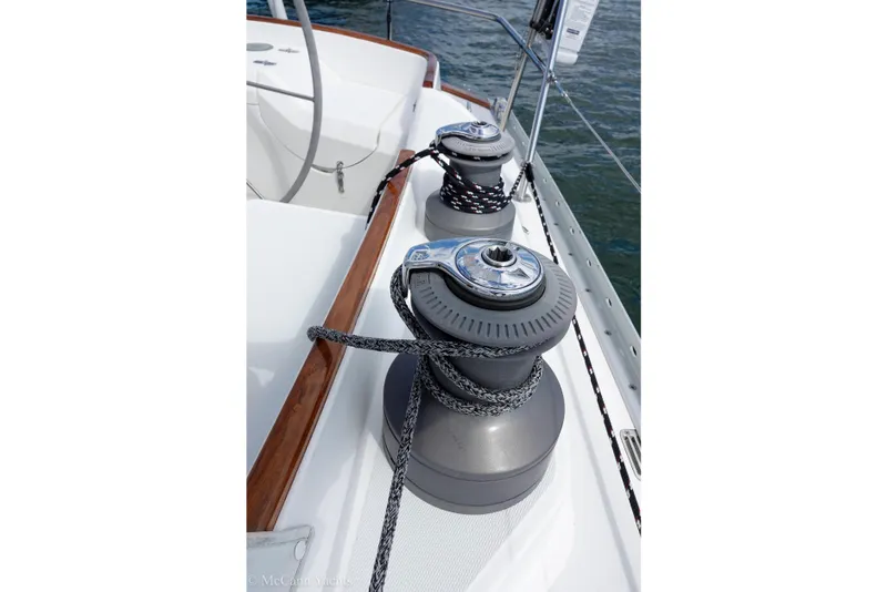Slide: The Image of Winches on 1993 Alden 43 Aft Cockpit sailboat deck, with ropes and polished wood trim. - 17