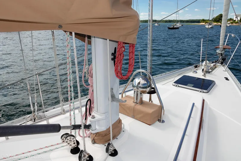 Slide: The Image of Sailboat deck view of 1993 Alden 43 Aft Cockpit on calm water. - 20