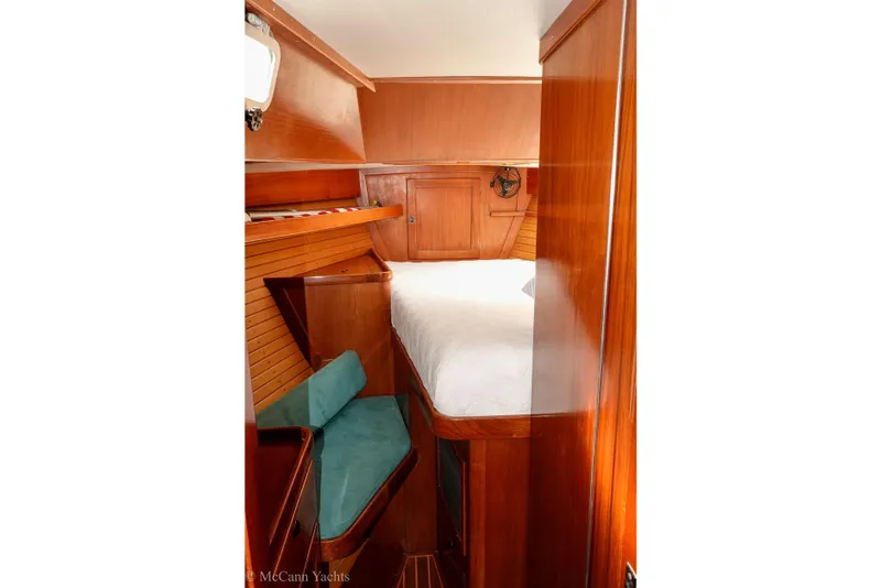 Slide: The Image of Cozy cabin interior of 1993 Alden 43 Aft Cockpit yacht with wooden finish. - 45