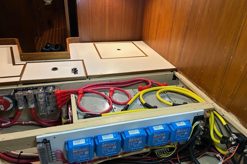 Slide: The Image of Electrical system of a 1993 Alden 43 Aft Cockpit yacht with wiring and components. - 59