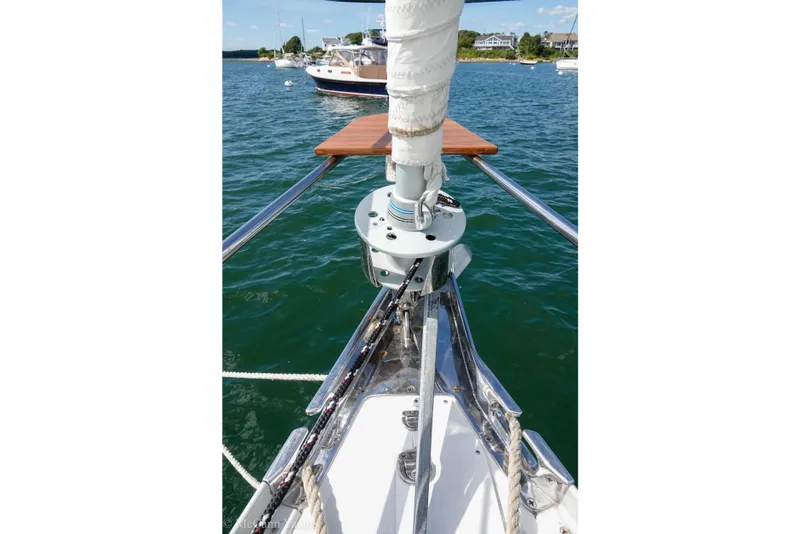 Slide: The Image of Bow view of 1993 Alden 43 Aft Cockpit sailboat on calm water. - 66