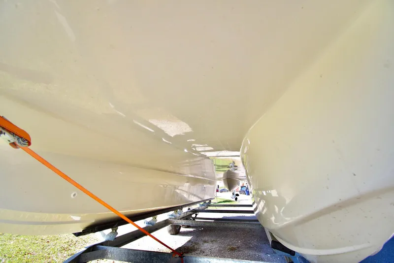 Slide: The Image of 2023 Beachcat 23 Catamaran underside view on trailer. - 15