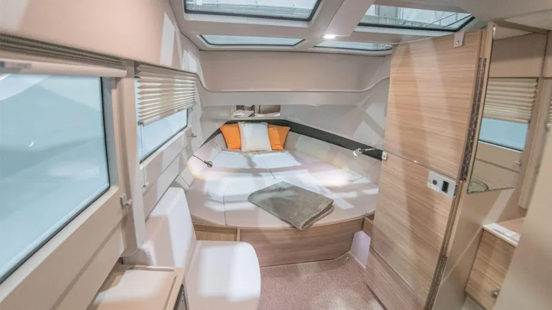 Slide: The Image of Luxurious interior of 2025 Saxdor 320 GTC yacht with modern design and skylights. - 10