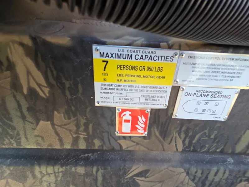 Slide: The Image of Safety label of Crestliner 1860 Retriever SC, capacity: 7 persons, year 2026. - 17