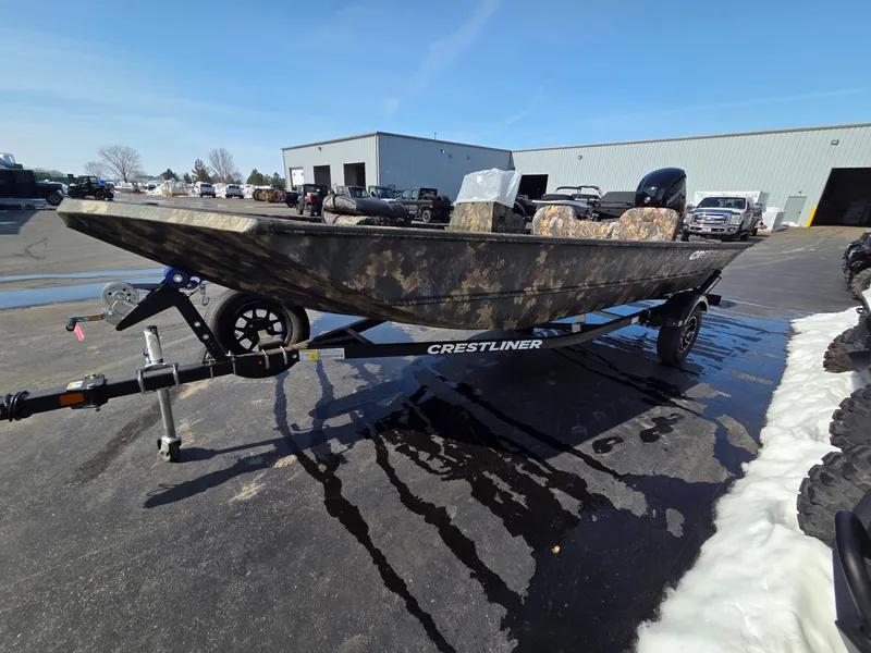 Slide: The Image of 2026 Crestliner 1860 Retriever SC boat on trailer outdoors. - 6