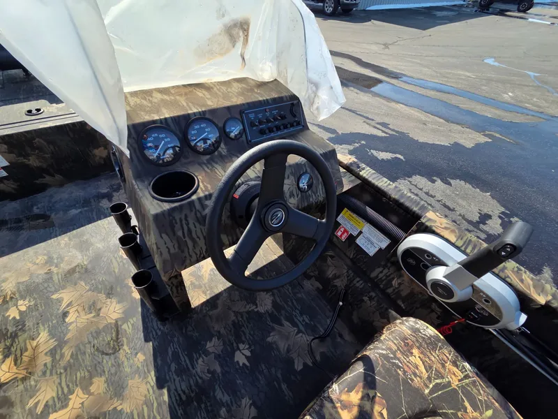 Slide: The Image of Interior view of 2026 Crestliner 1860 Retriever SC boat. - 9