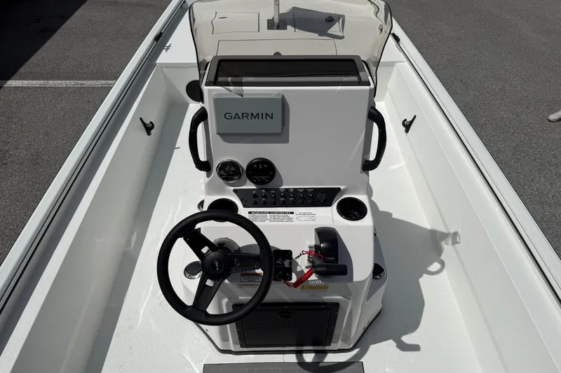 Slide: The Image of Center console of 2026 Avid 20 Rogue CC boat with Garmin navigation system. - 23