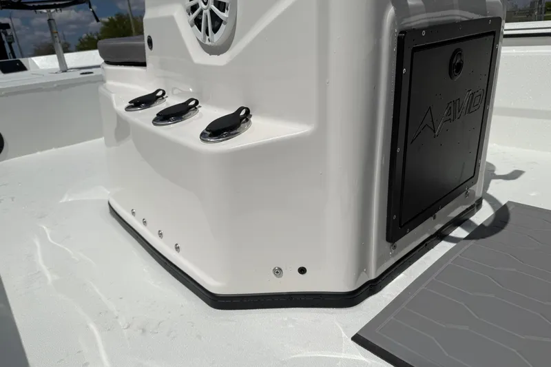 Slide: The Image of Avid 20 Rogue CC 2026 boat console with speaker and storage compartment. - 9