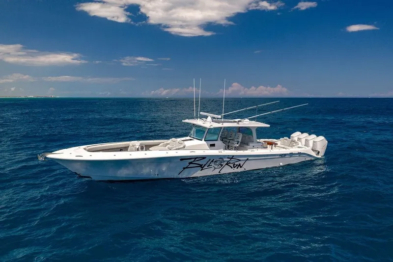 The Image of 2023 HCB 53 Suenos boat cruising on open ocean under clear blue sky. - 0