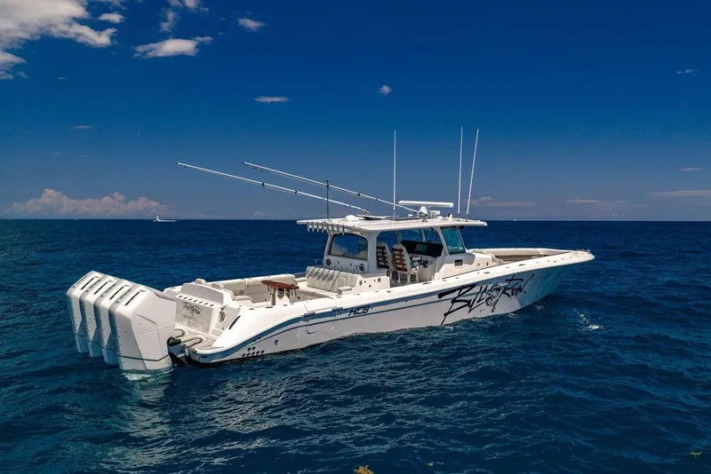 Slide: The Image of 2023 HCB 53 Suenos boat on open ocean under clear blue sky. - 3