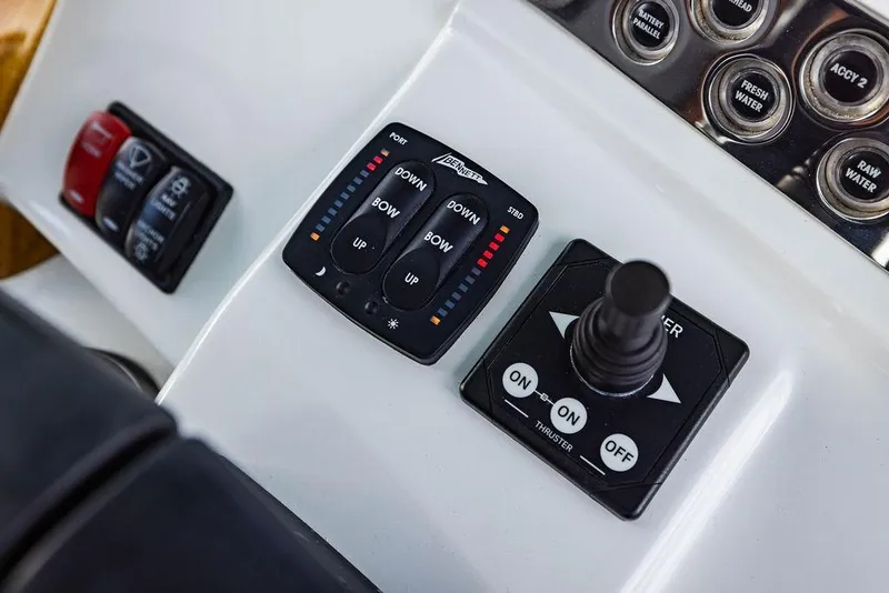 Slide: The Image of Control panel of 2023 HCB 53 Suenos boat with switches and joystick. - 34