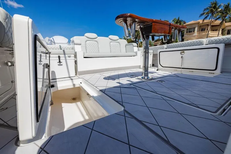 Slide: The Image of 2023 HCB 53 Suenos boat interior with luxurious seating and storage compartments. - 37