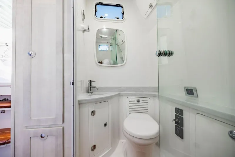 Slide: The Image of Luxurious bathroom interior of 2023 HCB 53 Suenos yacht, featuring modern fixtures and sleek design. - 49