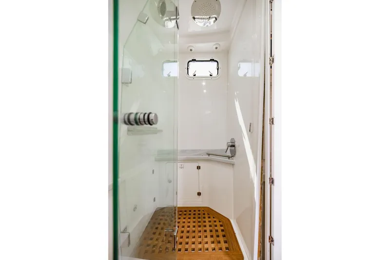 Slide: The Image of Luxurious bathroom interior of 2023 HCB 53 Suenos yacht with wooden flooring. - 50